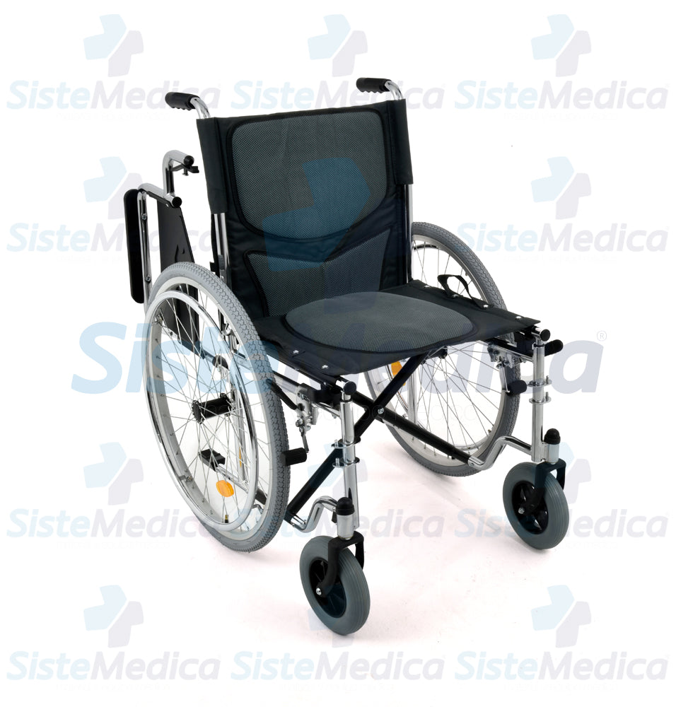 Silla de ruedas de acero cromada con asiento acojinado de 48.26 cm / 19”  con descansa brazos costos abatibles y descansa pies desmontables