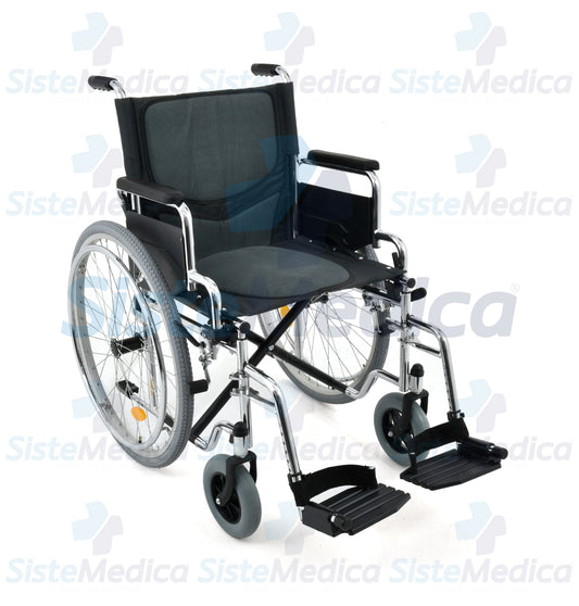 Silla de ruedas de acero cromada con asiento acojinado de 48.26 cm / 19”  con descansa brazos costos abatibles y descansa pies desmontables